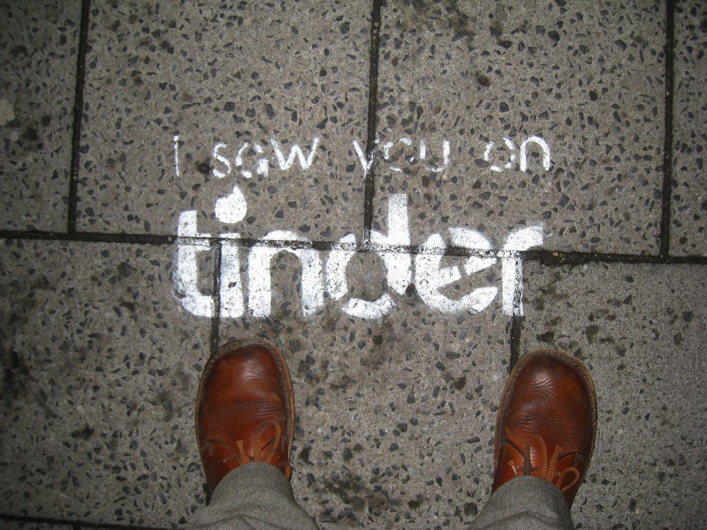 Tinder art with tagline